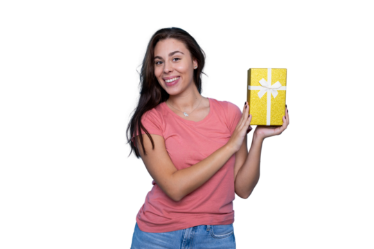 Happy woman showing golden gift box with white bow, isolated on transparent background