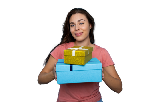 Cheerful woman grasping wrapped presents - light blue large gift and smaller golden package - isolated backdrop - Powered by Adobe