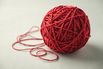 Red Yarn Ball on Light Background for Crafting and Knitting Generative AI
