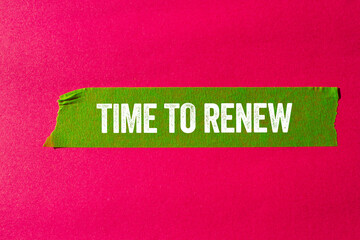 Time to renew message written on ripped torn green paper tape on pink background. Conceptual time to renew symbol. Copy space.