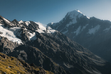 Layers of snow in the mountain tops during summer time in the Southern Alps, New Zealand.