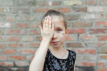 A happy girl in an elegant black dress. Stylish and fashion concept, Helloween