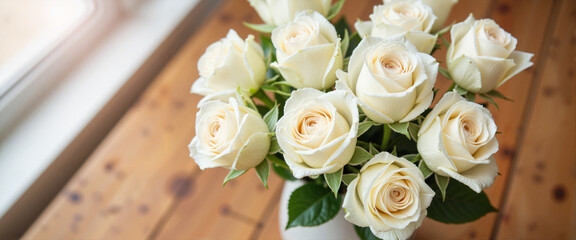 Obraz premium Elegant white rose bouquet in soft morning light, serene beauty