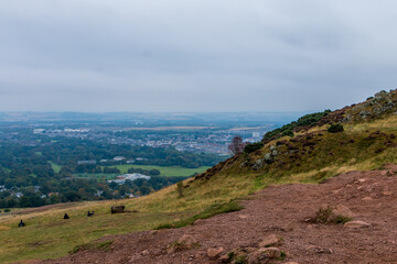 Beautiful view from Arthur's Seat to Edinburgh and the surrounding landscape. Hiking in Scotland.