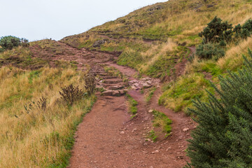 Beautiful view from Arthur's Seat to Edinburgh and the surrounding landscape. Hiking in Scotland.