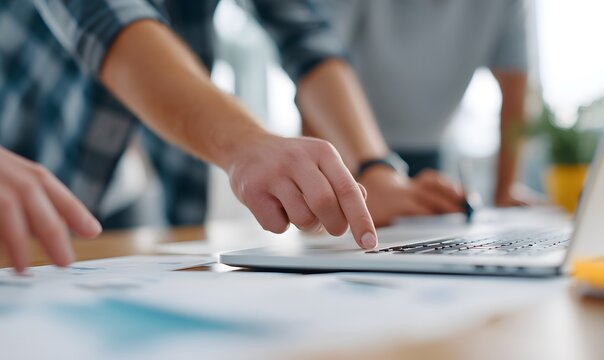 Business team in office focused on hands pointing at laptop screen. Generative AI