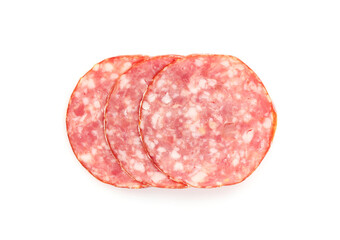 Slices of tasty smoked sausage on white background, top view