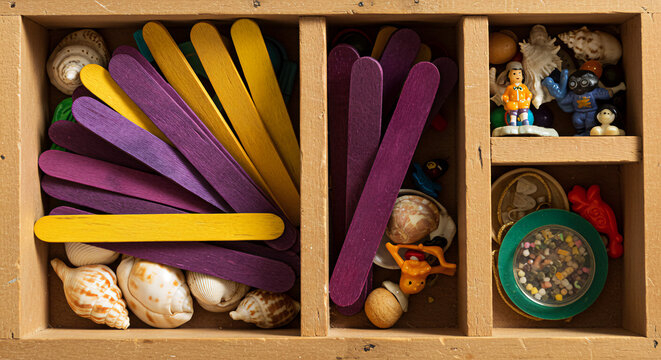 Grape popsicle stick collection in child's memory box