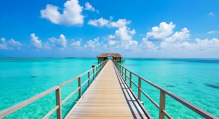 Obraz premium Tropical Wooden Pier Leading to Overwater Bungalows Above Crystal Clear Turquoise Ocean Under