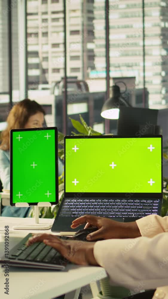Aufkleber vertical video mockup tablet and laptop in office used by employee working on company administrative