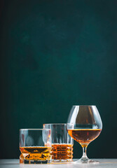 Strong hard alcoholic drinks, spirits, liqueurs, distillates, whiskey and others. Drink background...