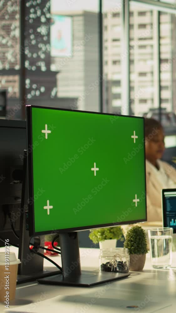 Poster vertical video green screen pc in office used by employee working on company administrative tasks. m