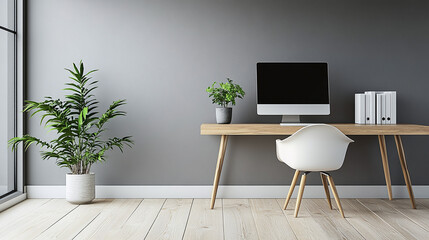 Modern and minimalist home office with a computer plants and wooden desk
