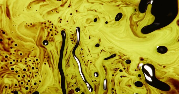 Alcohol ink blending and mixing create abstract art with mesmerizing fluid bland and yellow patterns and textures, forming a unique and visually appealing artwork