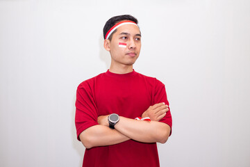 Confident Young Male Standing With Cross Arm Representing Nationalistic Attitude And Proud Indonesian Identity In Casual Look.