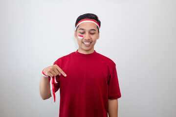 Indonesian Man Pointing Down With Happy Face, Proudly Embracing Nationalism And Celebrating...