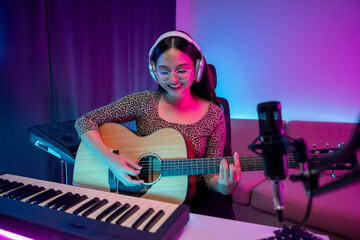 Professional Musician with condenser microphone and tablet for Mixing Mastering music. Music...
