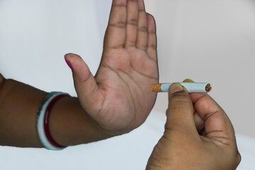 Stop Smoking Concept. Closeup Of Woman Hand Refusing To Take Cigarette. Human Hand Holding...