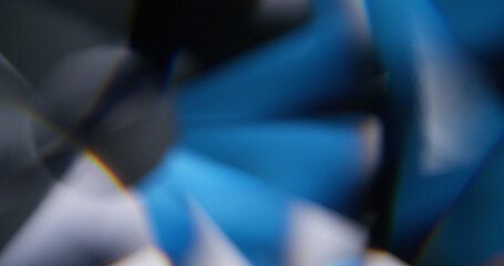 Refraction flare. Blur abstract light. Defocused blue red yellow rainbow spectrum round lens on art...