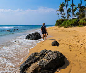 Female Tourist Walking on The Golden Sand of Kaanapali Beach, Kaanapali, Maui, Hawaii, USA