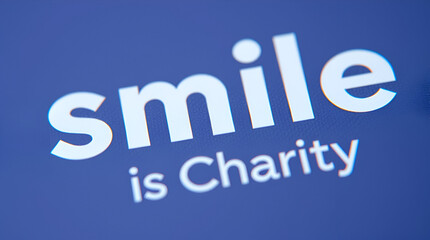 Smile is Charity Message on a Vibrant Blue Canvas