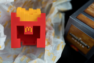 Fototapeta premium Bangkok, Thailand - April 8, 2025 : Fry Helmet Minecraft from McDonald, Toy form Minecraft blind box from McDonald's collaborates Minecraft the movice