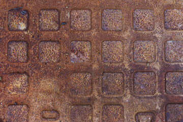 Close-up of a rusty metal plate.