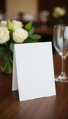 Minimalist white table sign on dark wood surface for wedding or reception, display, rustic