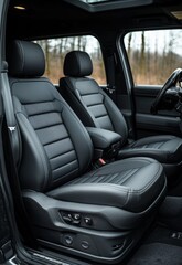 Durable Black Vehicle Interior with Comfortable Cushions for Peaceful Road Trips