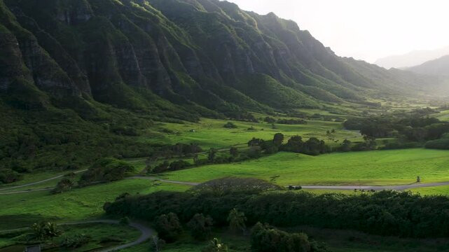 Legendary oahu mountains in hawaii with cinematic lighting - drone shot
