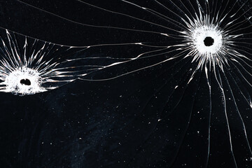 Bullet holes on black glass, overlay design background