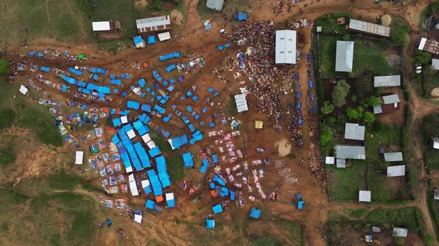 Indigenous People Trading Goods At Tribal Market In Kako Village, Omo Valley, Ethiopia. aerial topdown shot