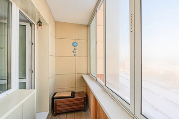 interior apartment room balcony overlooking the street, empty space without furniture