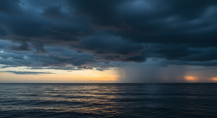 A brooding seascape shot at dusk, showcasing dark, swirling clouds