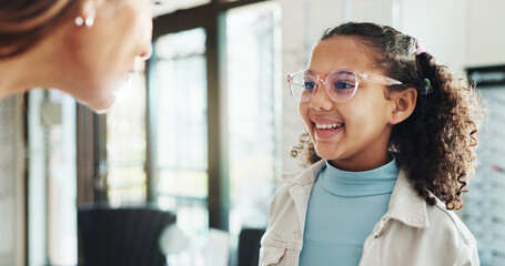 Happy girl, glasses and optometry with lens for eyecare, sight or vision aid at optometrist. Little...