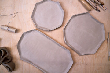 view of handmade clay plate blanks, top view