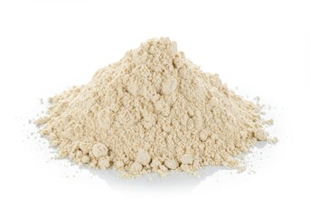 A pile of beige powder is displayed against a plain white backdrop in a studio setting here