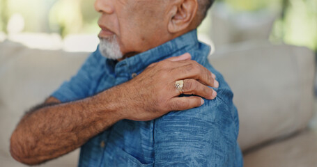 Senior, man and hands on shoulder pain in home with muscle tension, arthritis and discomfort....