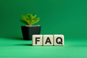 Fag on wooden cubes text on a green background