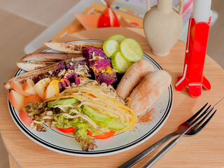 Eggs wrap with vegetables for breakfast. Morning time. Delicious food. Cooking recipes. Brunch. Healthy recipe. American breakfast. Easy breakfast. First meal. Brunch menu. Diet menu. Favourite dish.