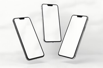 Floating mockup of three modern smartphones with blank white screens on light background. Perfect for showcasing mobile app design or responsive website previews.