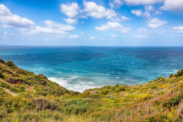 Attractive spring view of Nebida and Fontanamare coastline and turquoise sea.