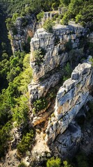 Aerial View of Dramatic Limestone Cliffs and Lush Green Forest