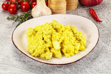 Italian cuisine - yellow risotto with chicken