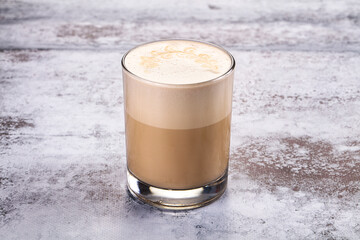 Hot latte beverage in the glass