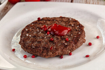 Grilled juicy beef cutlet for burger