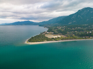 Aerial View of Peninsula with Coastal Lagoon and Olive Trees in Central Greece