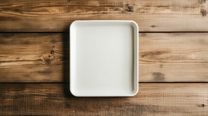 Empty white tray on wooden table