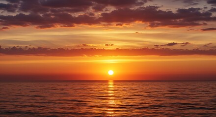 Fototapeta premium Sunset on red yellow sky back soft evening cloud over sea