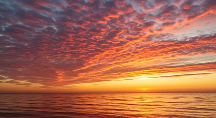 Fototapeta premium Sunset on red yellow sky back soft evening cloud over sea